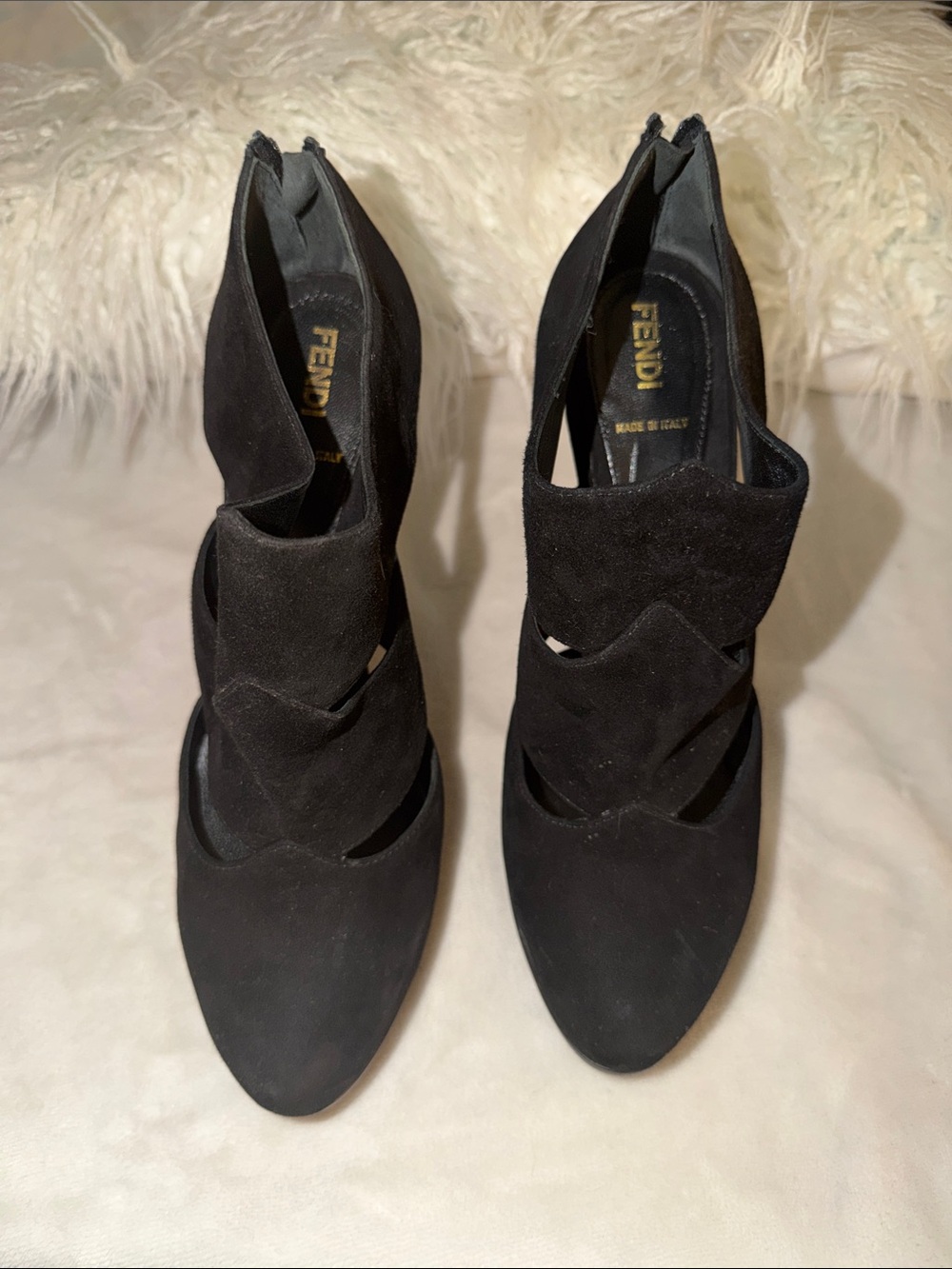 Fendi Black Suede Sculpted Cutout Heels. Engraved Fendi logo on heel.